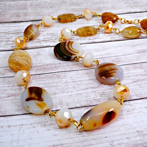A mix of beige, brown, and off white bead necklace with glass and stone - Picture 9 of 13